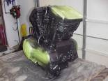 After taping off all the chrome covers I shot the engine with 1200 degree flat black paint.  This REALLY cleaned up the look of the engine as it had been quite faded and corroded looking before. 