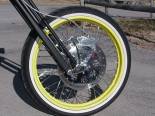 Custom Maltese Cross rotor and high dollar springer front brake system.  I love the look of the 21" front wheel too! 