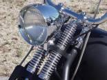 Another shot of the flat black and chrome springer front end.  The after market headlight turned out nice although I think the stock one as ugly as it is would have been more 50's looking. 