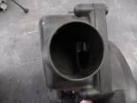 This is a look at the small hole coming from the air box under the gas tank on your stock Kawasaki Vulcan 800. The air has to make several 90 degree turns before making it to the carburator on the stock system.  This is why it is impossible to make any power until you change your intake system. 