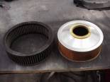 A stock paper air filter on the right next to a K&N oil soaked fiber filter on the left.  This filter came off another bike and is dirty.  The beauty of the K&N filter is you wash it and oil it and it looks brand new again!  This one is due for a bath.......... 