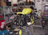 It finally fit like I wanted so I welded it in place.  I welded it at the same angle as the rake on the front end so the lines of the bike would flow as viewed from the side. Pay no attention to the Vulcan 800 parts bins in the back ground......... 