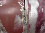 Then go back and fill in between the spot welds until you have the entire perimeter welded up.  Skip around a lot to prevent the panel from warping from too much heat in one spot. If you're not a professional welder you do it like this then you get out your trusty grinder and smooth the welds down........ 