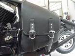This is the saddle bag/ side cover.  This is mounted so well you could almost pick the bike up by it.  This saddle bag came with 4 wimpy leather straps that were supposed to go around the frame to hold it on.  I could see that lasting about 15 minutes in the real world.........lol.  Now I can put as much as I want inside the saddle bag and not worry about it falling off.  Notice how the top and bottom of the saddle bag are cut at the same angle as the upper and lower frame tubes.  This thing looks like it was custom made for this bike!! 