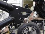 I used that strange threaded port that sticks out on the end of the Vulcan 800 Swing arm to mount the side mounted liscense plate and maltese cross tail light. I forget where this chrome bolt was used originally but it works perfectly here. 