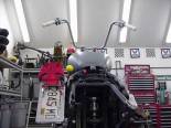 A low shot from the rear of the Bobber,  You can see how high the ape hangers are,  You can also see the suicide shifter and side mounted liscense plate. 